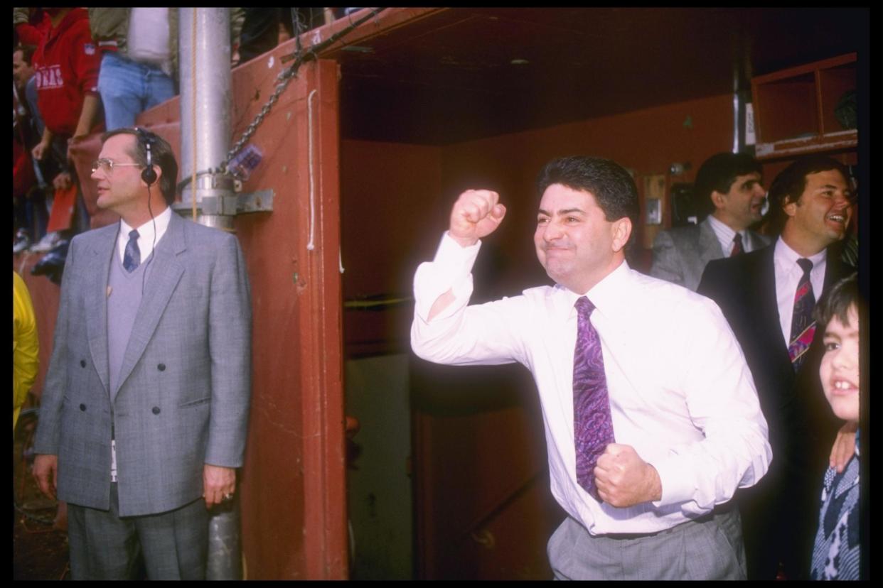 San Francisco 49ers owner Eddie DeBartolo celebrates during a playoff game against the Minnesota Vikings at Candlestick Park in 1990: Getty Images