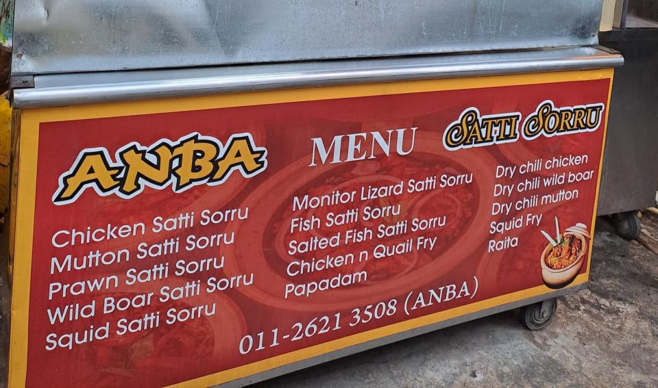 A store menu of Satti Sorru, a hawker stall in Kuala Lumpur that sells claypot-cooked rice.