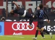 Inter Milan's Joel Obi celebrates after scoring against AC Milan during their Italian Serie A soccer match at the San Siro stadium in Milan November 23, 2014. REUTERS/Alessandro Garofalo