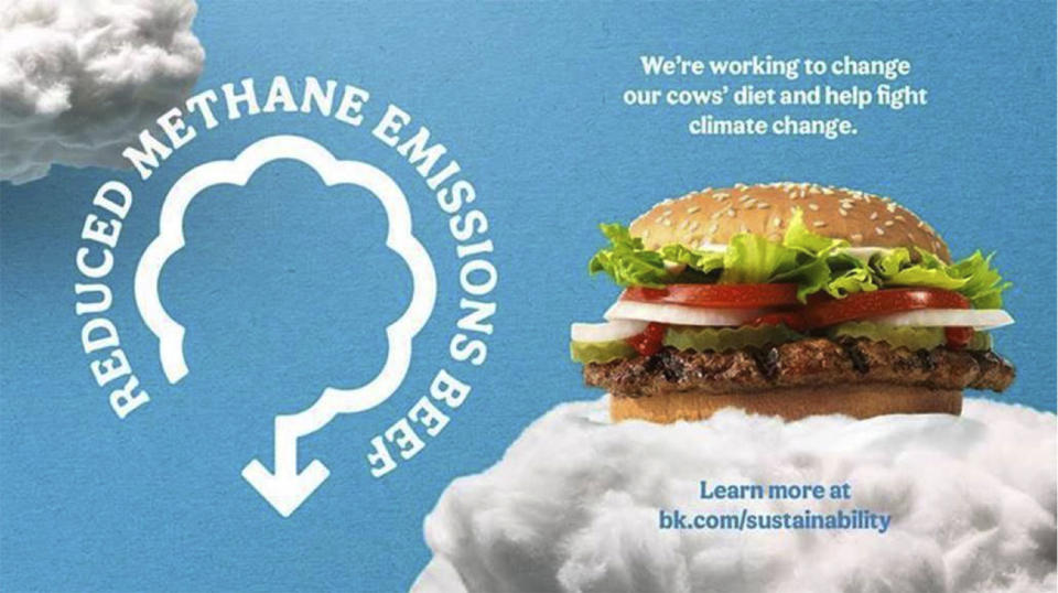 In this photo provided by Burger King, shows the company announcing its work to help address a core industry challenge: the environmental impact of beef. To help tackle this environmental issue, the Burger King brand partnered with top scientists to develop and test a new diet for cows, which according to initial study results, on average reduces up to 33% of cows' daily methane emissions. (Burger King via AP)