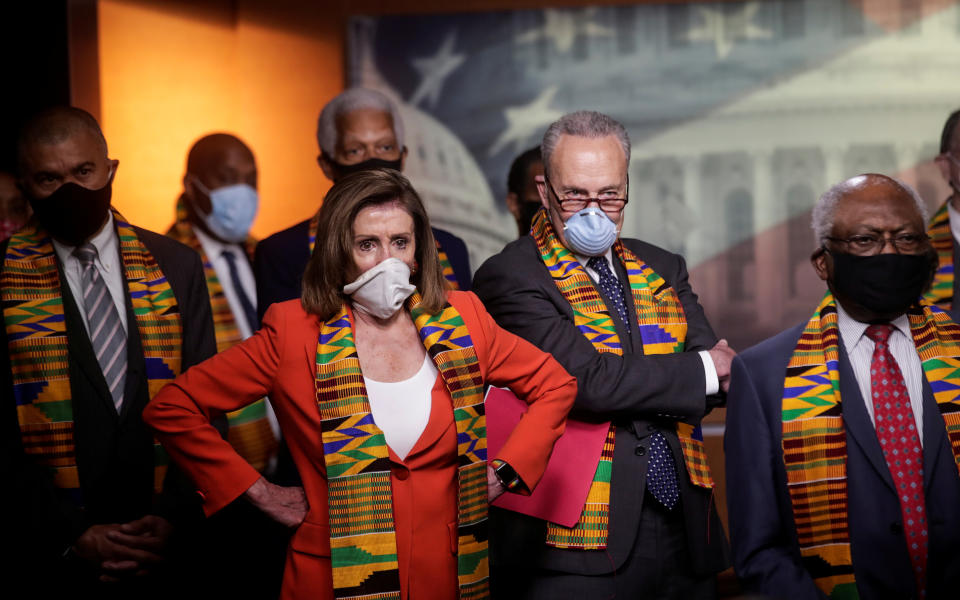 House Speaker Nancy Pelosi, Senate Minority Leader Chuck Schumer and other Congressional Democrats during a news conference Monday. (Jonathan Ernst/Reuters)