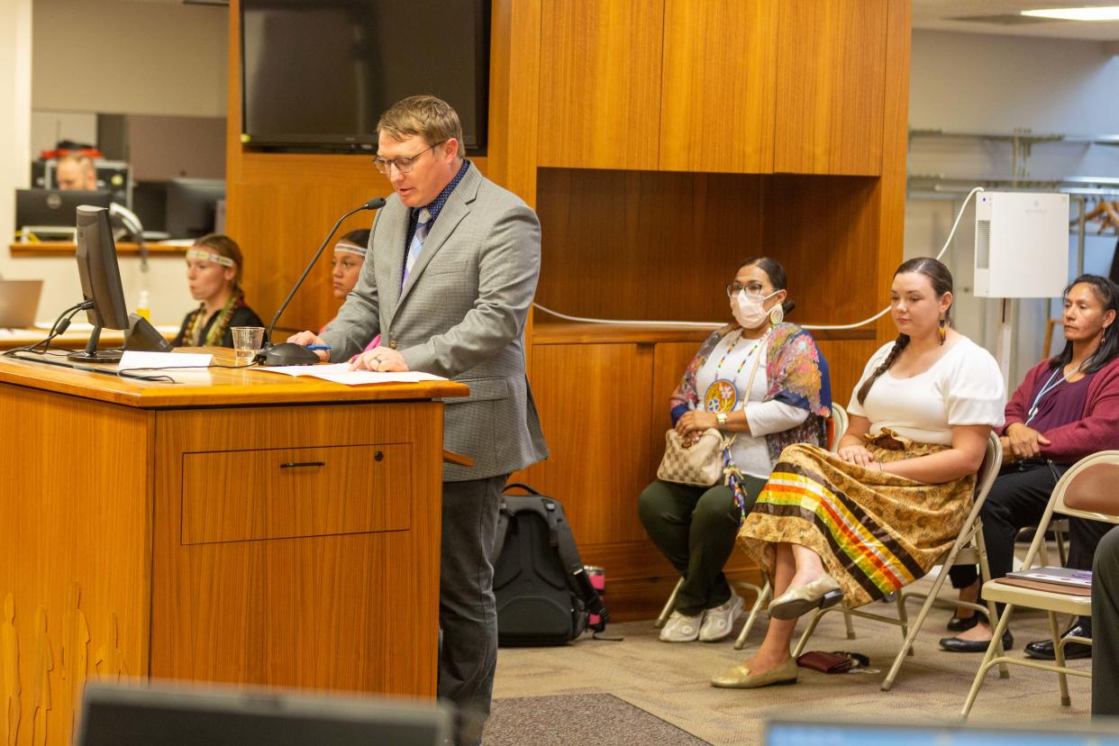 Alex Red Corn, an assistant professor of educational leadership at Kansas State University and a member of the Osage Nation, presents on the topic of American Indian mascots and imagery at a Kansas State Board of Education meeting last month.