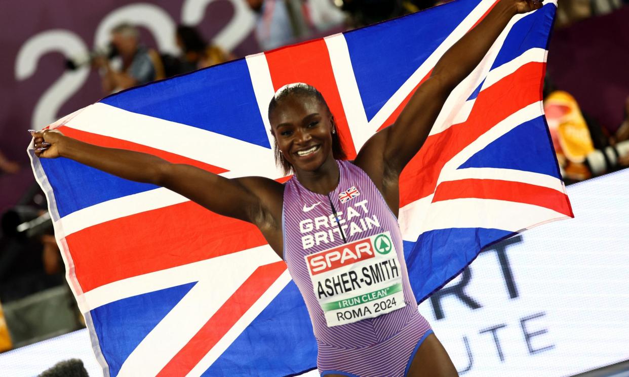 <span>Dina Asher-Smith celebrates winning the women's 100m final.</span><span>Photograph: Kai Pfaffenbach/Reuters</span>