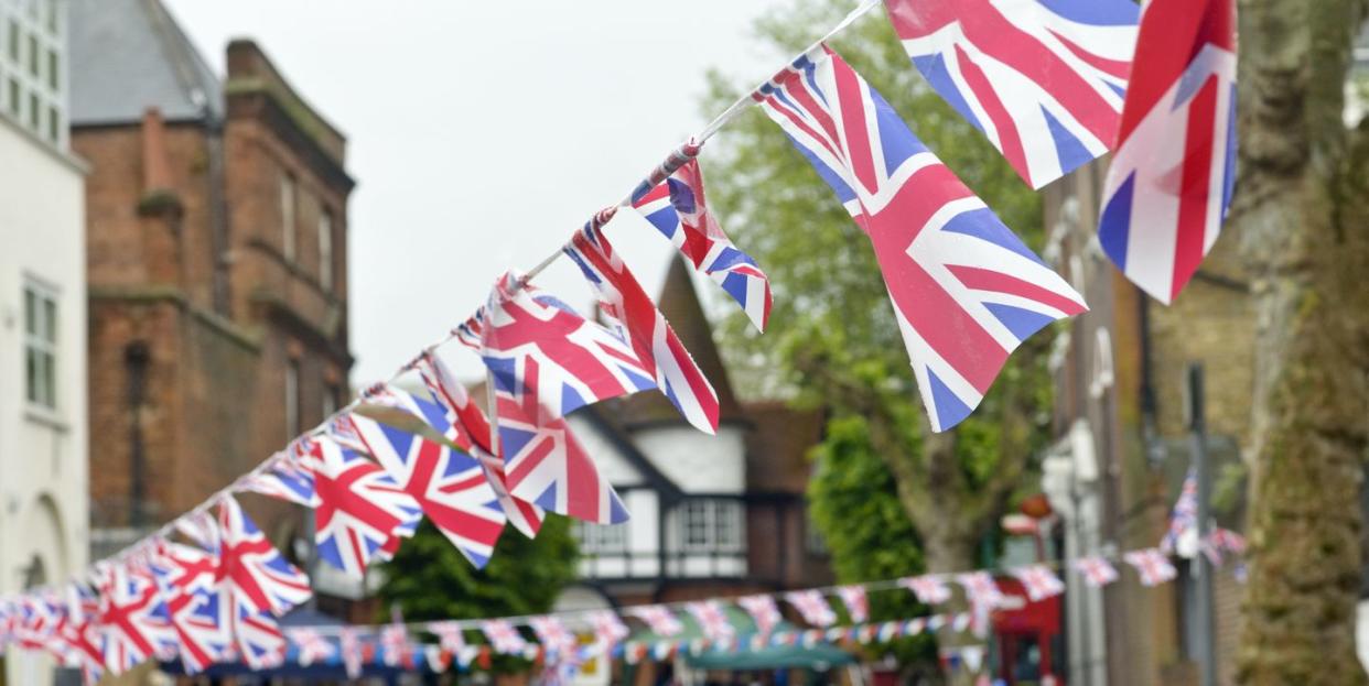 royalty free stock photo of union jack flags bunting in local street partysee