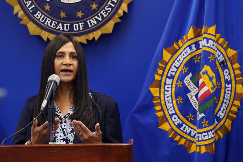 Special Agent Elizabeth Rivas, FBI's Art Crime Team Members, Los Angeles Field Office takes questions from the media at a repatriation ceremony following investigations by the FBI's Art Crime Team at the FBI headquarters in Los Angeles Friday, April 22, 2022. The FBI returned sixteen cultural items to representatives of the Peruvian government, from its pre-Columbian era through its Spanish Colonial Period and into the 20th Century. (AP Photo/Damian Dovarganes)