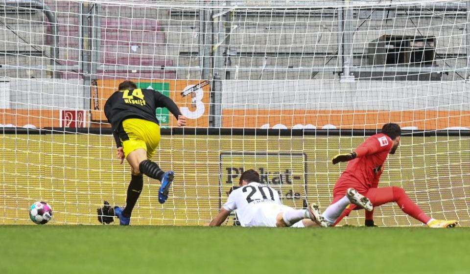 Daniel Caligiuri scores their second goal in the win over Dortmund.