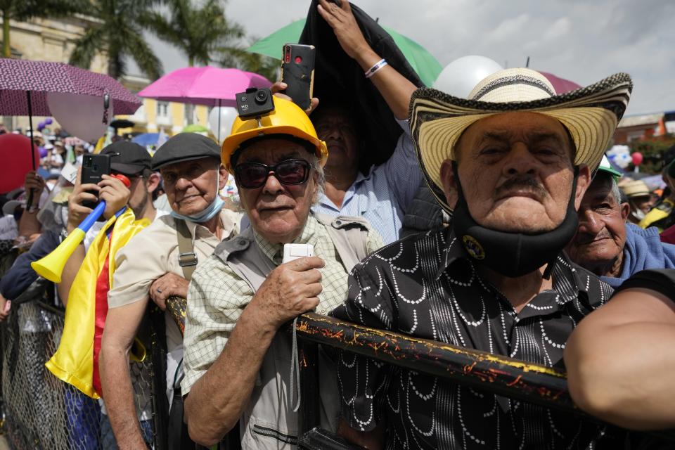 FILE - Supporters of presidential candidate Gustavo Petro of the Historical Pact coalition, attend a campaign rally in Fusagasuga, Colombia, May 11, 2022. Colombians emerging from the coronavirus pandemic are heading to the polls to pick their next president on Sunday, May 29, choosing from six candidates who all promise various degrees of change amid rising inequality, inflation, violence and a discontent with the status quo. (AP Photo/Fernando Vergara, File)