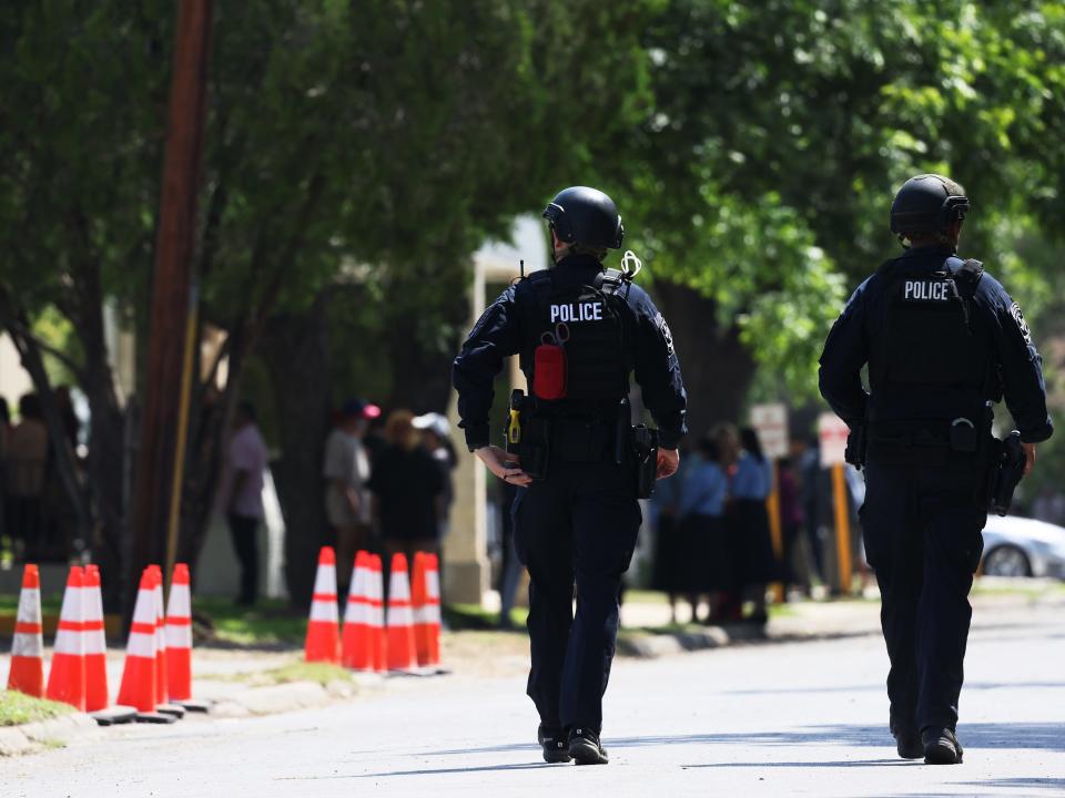 Law enforcement officials prepare for the arrival of President Joe Biden's attendance for mass at Sacred Heart Catholic Church on May 29, 2022 in Uvalde, Texas.