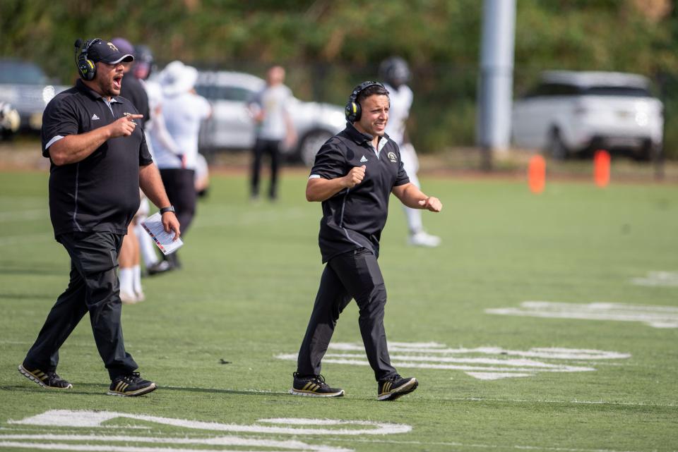 Paramus Catholic Football at Hudson Catholic on Saturday, Sept. 3, 2022. PC head coach Greg Russo celebrates after his team scored a touchdown in the fourth quarter. 