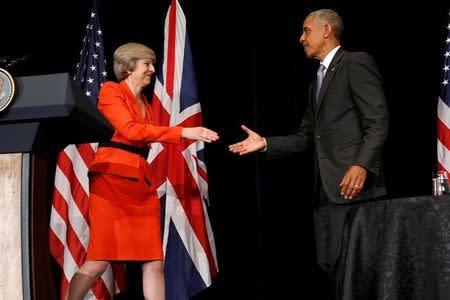 Britain's Prime Minister Theresa May (L) and U.S. President Barack Obama shake hands after speaking to reporters following their bilateral meeting alongside the G20 Summit, in Ming Yuan Hall at Westlake Statehouse in Hangzhou, China September 4, 2016. REUTERS/Jonathan Ernst