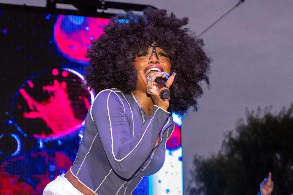 <p>Christopher Polk/Billboard via Getty</p> SZA performs at the 10th Annual TDE Christmas Concert hosted by Top Dawg Entertainment and Jay Rock December 19, 2023 in Compton, California