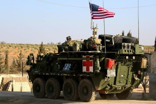 US forces with armored vehicles have been supporting the fight against IS in Syria