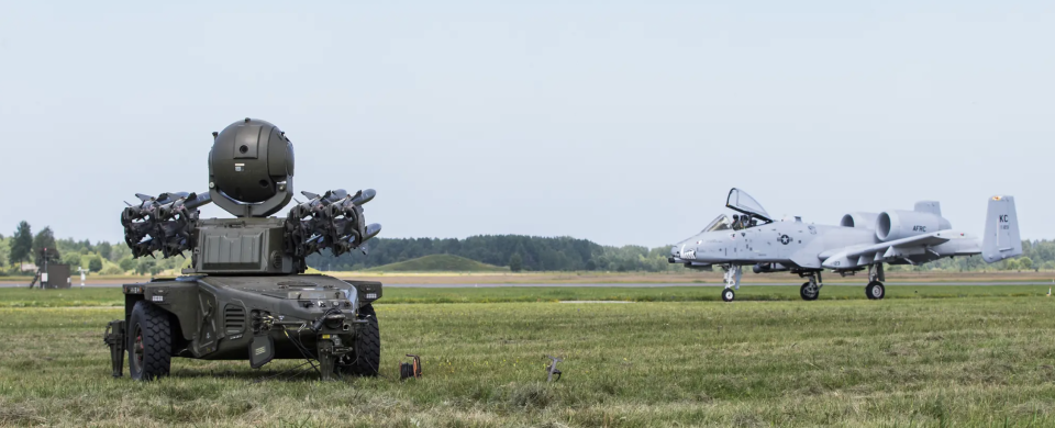 A British Army Rapier SHORAD system protects a runway while deployed to Estonia, while a U.S. A-10 taxis past. <em>Crown Copyright</em>