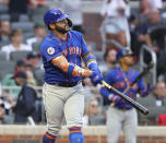 New York Mets' Jonathan Villar watches his two-run home run against the Atlanta Braves during the third inning of a baseball game Tuesday, May 18, 2021, in Atlanta. (Curtis Compton/Atlanta Journal-Constitution via AP)