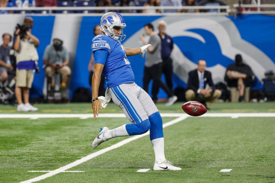 Detroit Lions punter Ryan Santoso (2) punts the ball during the second half of the preseason game against New York Giants at Ford Field in Detroit, Friday, August 17, 2018.