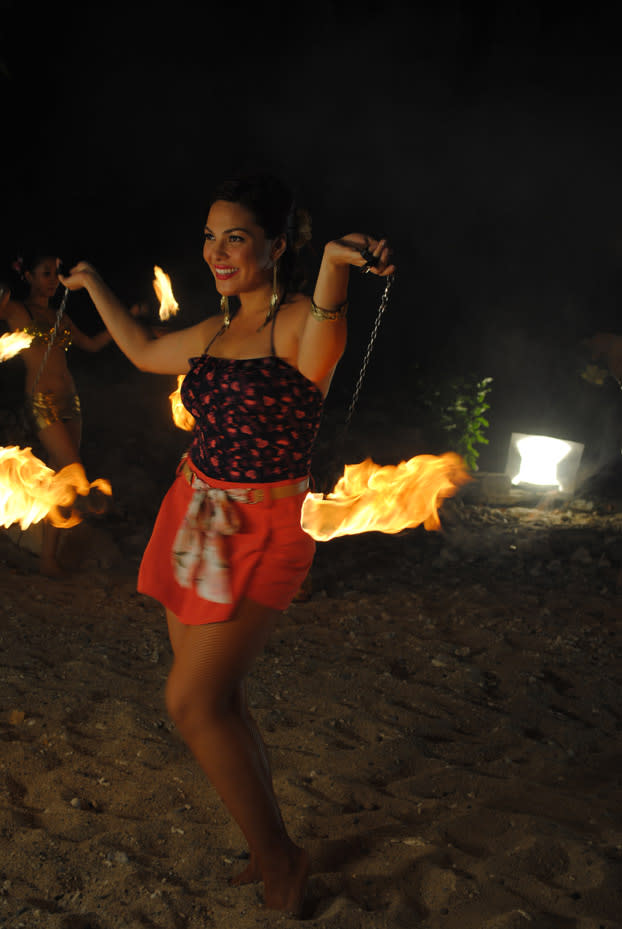 "X Factor Philippines" host KC Concepcion doing a fire dance.