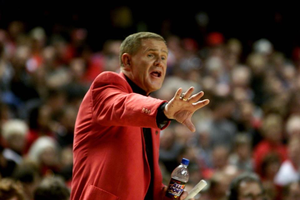 U of L coach Denny Crum, in his last home game, directs his team on March 3, 2001.