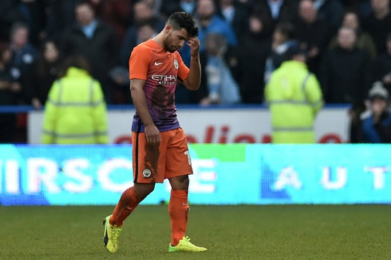 Manchester City's Sergio Aguero reacts as he leaves the pitch after the English FA Cup fifth round football match against Huddersfield Town at the John Smith stadium in Huddersfield on February 18, 2017