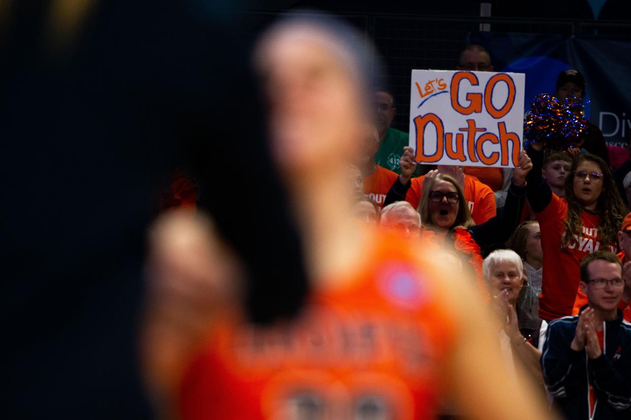 Hope fans wave signs from the stands during player introductions Saturday, March 19, 2022, at UPMC Cooper Fieldhouse in Pittsburgh. 