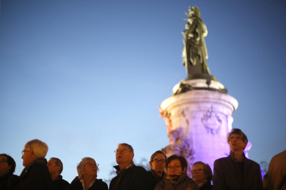 People gather at Republique square to protest against anti-Semitism, in Paris, France, Tuesday, Feb. 19, 2019. In Paris and dozens of other French cities, ordinary citizens and officials across the political spectrum geared up Tuesday to march and rally against anti-Semitism, following a series of anti-Semitic acts that shocked the nation. (AP Photo/Thibault Camus)