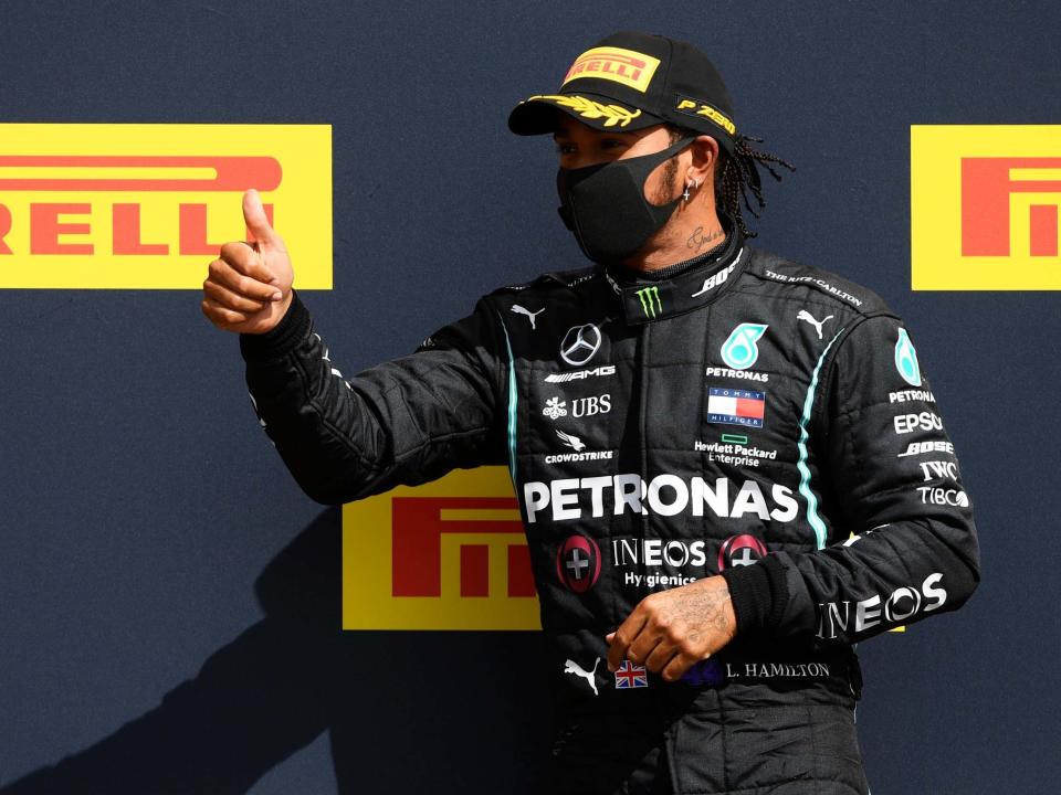 Lewis Hamilton celebrates his victory in the British Grand Prix: Getty