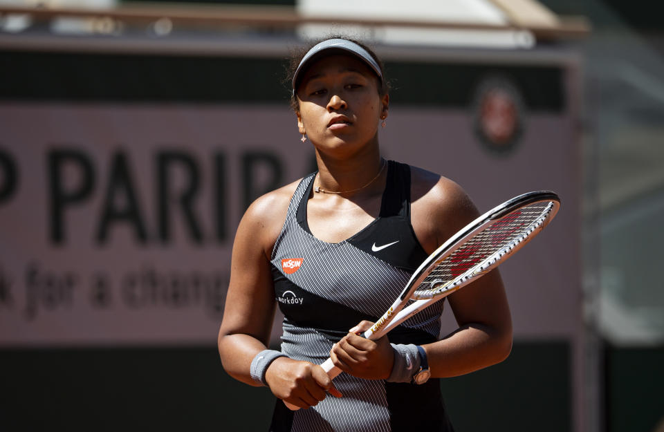 PARIS, FRANCE - MAY 30: Naomi Osaka of Japan looks frustrated during her match against Patricia Maria Țig of Romania in the first round of the women’s singles at Roland Garros on May 30, 2021 in Paris, France.