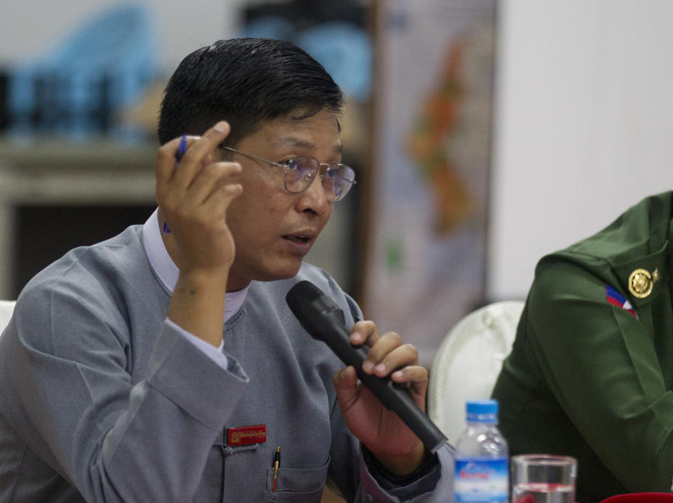 Myanmar's government spokesman Zaw Htay talks to journalists during a press briefing on recent developments in Rakhine State including arrangements for repatriation of displaced persons, Sunday, Nov. 11, 2018, in Yangon, Myanmar. (AP Photo/Thein Zaw)