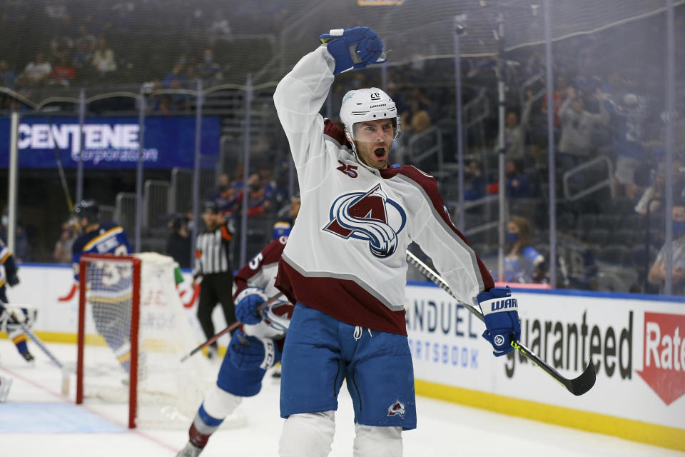 Colorado Avalanche's Brandon Saad (20) celebrates his goal against the St. Louis Blues during the third period in Game 3 of an NHL hockey Stanley Cup first-round playoff series Friday, May 21, 2021, in St. Louis. (AP Photo/Scott Kane)