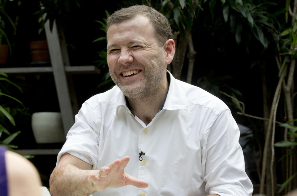 Max Boon speaks during an interview in Jakarta, Indonesia, on Monday, April 29, 2019. In 2009, a suicide bomber detonated his devices in the Jakarta JW Marriott lobby lounge where Boon was attending a business breakfast. Though doctors amputated most of his left leg and his lower right leg, the attack hadn't shaken Boon's belief in the goodness of humans. Boon threw himself into peacebuilding efforts and co-founded a group that is working to reconcile ex-terrorists and victims. (AP Photo/Achmad Ibrahim)