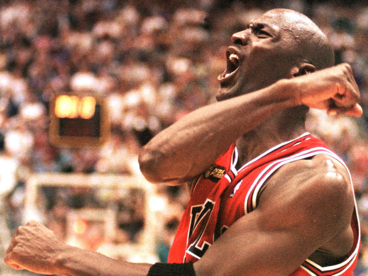 Michael Jordan of the Chicago Bulls celebrating his team's victory in the NBA Finals against the Utah Jazz: Getty