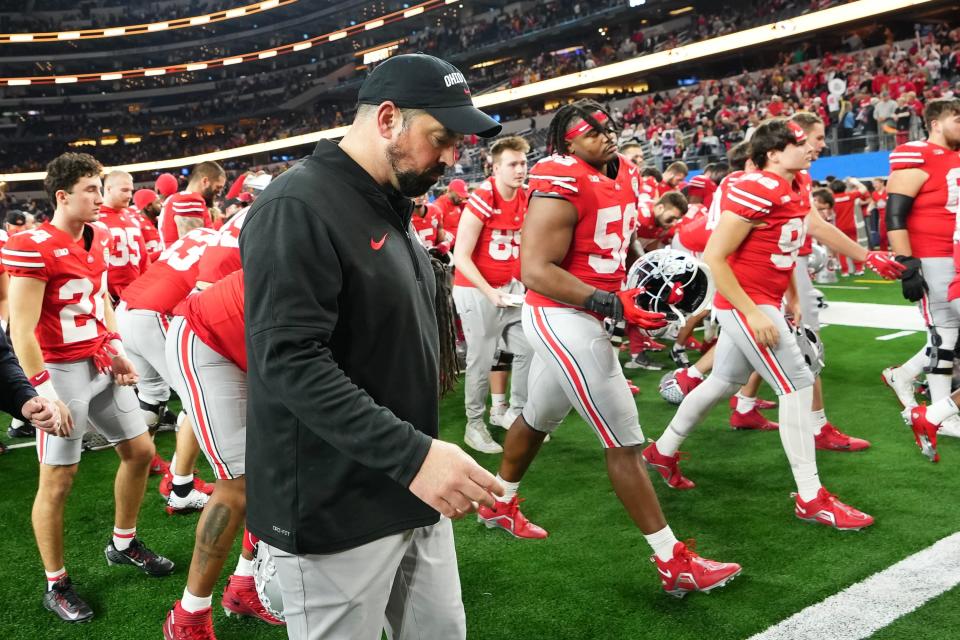 Dec 29, 2023; Arlington, Texas, USA; Ohio State Buckeyes head coach Ryan Day walks off the field following their 14-3 loss to the Missouri Tigers in the Goodyear Cotton Bowl Classic at AT&T Stadium.