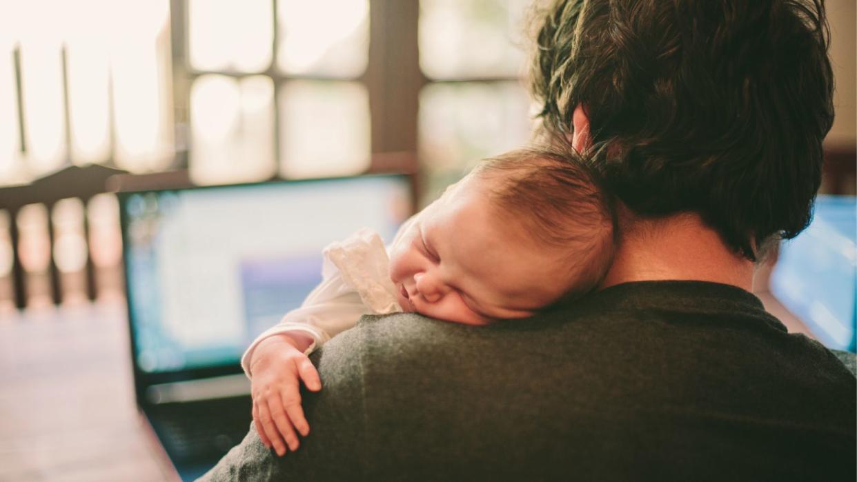 Man holding baby