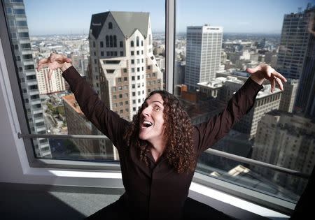 Musician "Weird Al" Yankovic poses for a portrait in the Reuters bureau in Los Angeles, California July 24, 2014. REUTERS/Lucy Nicholson