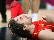 LONDON, ENGLAND - AUGUST 12: Pau Gasol #4 of Spain lies on the court after he was struck in the face during the Men's Basketball gold medal game between the United States and Spain on Day 16 of the London 2012 Olympics Games at North Greenwich Arena on August 12, 2012 in London, England. (Photo by Christian Petersen/Getty Images)