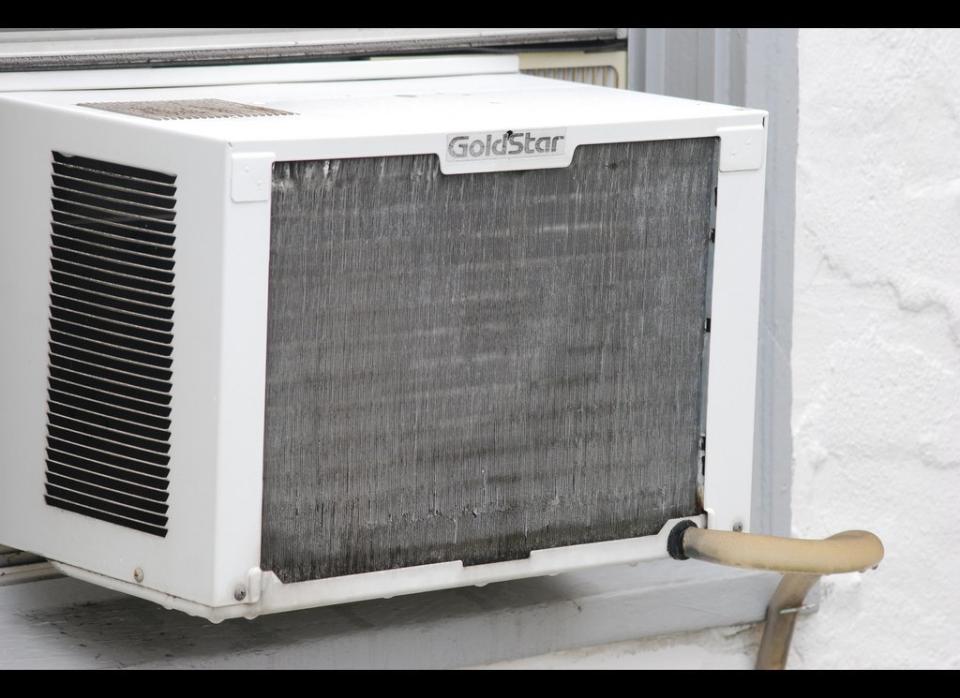 Cleaning your air conditioner's filter is a must to help avoid allergens in your home and to keep the machine working efficiently over the years. First, unplug your air conditioner. Then remove the filter. Use your vacuum to remove any loose dirt and grime. Next, soak the filter in one part vinegar and one part water for about four hours. This will kill harmful bacteria. Afterwards, place the filter on a towel to absorb any excess water and allow it to completely dry.     For a full tutorial, head to <a href="http://www.doityourself.com/stry/how-to-clean-air-conditioner-filters#b" target="_hplink">Do It Yourself.</a> 