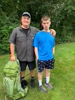 Michael McKenna, shown with his son Mike, is walking across the southern United States to raise funds to support the New England Center for Children, a Southborough school for students with autism. The younger Mike attended the school for 16 years.