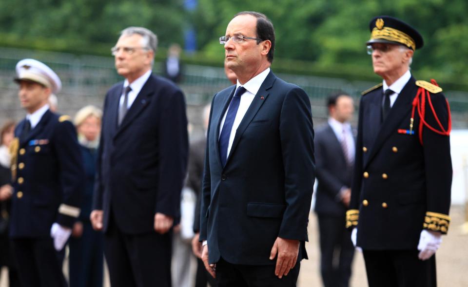 French President Francois Hollande attends a ceremony to mark the 72nd anniversary of Gen. Charles de Gaulle's appeal of June 18, 1940, at the Mont Valerien memorial in Suresnes, outside of Paris, Monday, June 18, 2012. The appeal, which was delivered on the BBC by Charles de Gaulle, served to rally his countrymen after the fall of France to Nazi Germany. (AP Photo/Bob Edme, Pool)