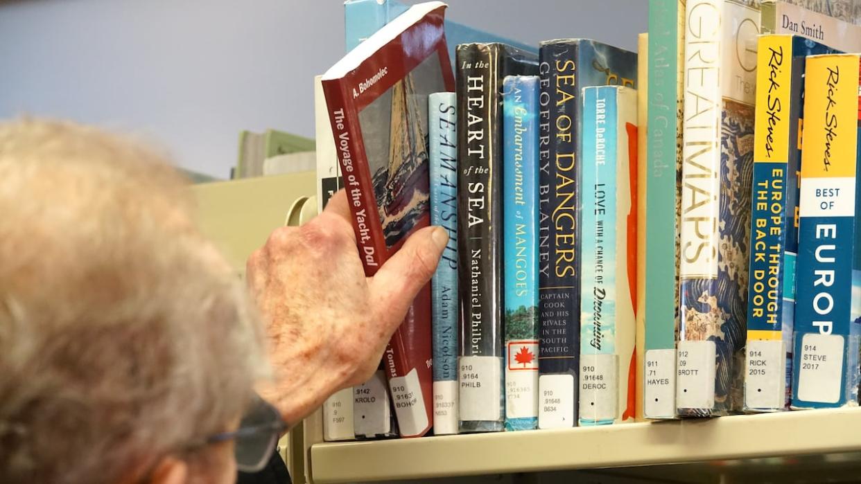 A new program by the Fredericton Public Library aims to bring the joy of story time to local senior's homes. (Hallie Cotnam/CBC - image credit)