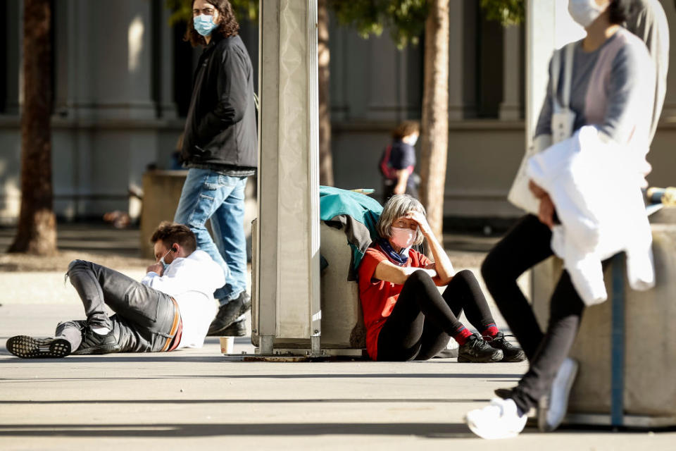 People line up outside the Covid-19 vaccination hub at the Royal Exhibition Building in Carlton in Melbourne, Australia. 