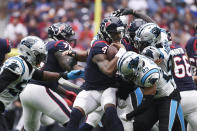 Houston Texans quarterback Deshaun Watson (4) is sacked by Carolina Panthers cornerback Javien Elliott (23) during the second half of an NFL football game Sunday, Sept. 29, 2019, in Houston. (AP Photo/Eric Christian Smith)