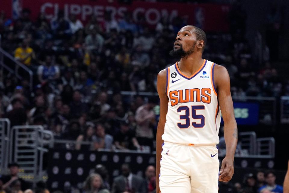 Phoenix Suns forward Kevin Durant stands on the court during the first half in Game Four of a first-round NBA basketball playoff series against the Los Angeles Clippers on April 22, 2023, in Los Angeles.