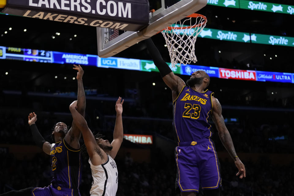 Los Angeles Lakers forward LeBron James (23) shoots during the second half of an NBA basketball game against the Brooklyn Nets in Los Angeles, Friday, Jan. 19, 2024. (AP Photo/Ashley Landis)