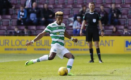 Britain Football Soccer - Heart of Midlothian v Celtic - Scottish Premiership - Tynecastle - 2/4/17 Celtic's Scott Sinclair scores their fifth goal with a penalty Reuters / Russell Cheyne Livepic