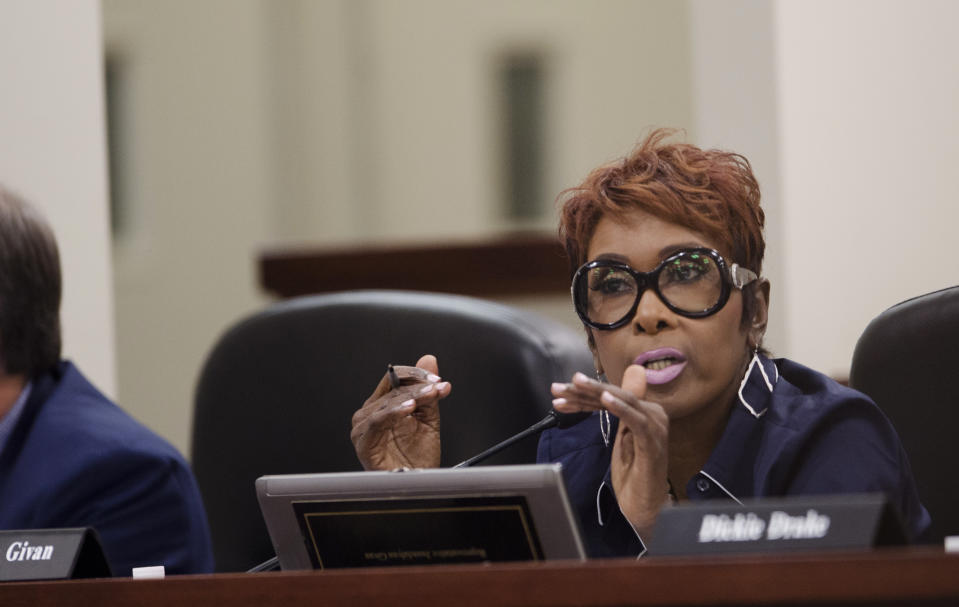 FILE - Alabama Rep. Juandalynn Givan asks a question during a hearing, April 10, 2017, in Montgomery, Ala. An Alabama high school band director said Wednesday, Sept. 20, 2023 that he was just “doing my job” when police officers arrested him and shocked him with a stun gun after he refused to immediately stop the band as it played in the bleachers following a football game. "You will see that my client never struck or never attempted to strike an officer,” state Rep. Juandalynn Givan, who is Mims’ attorney, said during a Wednesday news conference. (Albert Cesare/The Montgomery Advertiser via AP, Pool file)