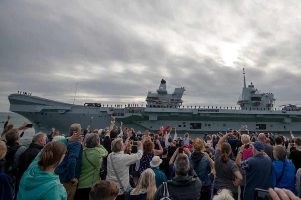 The aircraft carrier left Portsmouth on Saturday evening (PA)