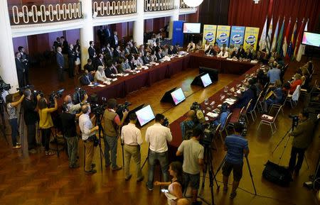 Health ministers from Mercosur-member countries participate in a meeting to discuss policies to deal with the Zika virus at the Mercosur building in Montevideo, February 3, 2016. REUTERS/Andres Stapff