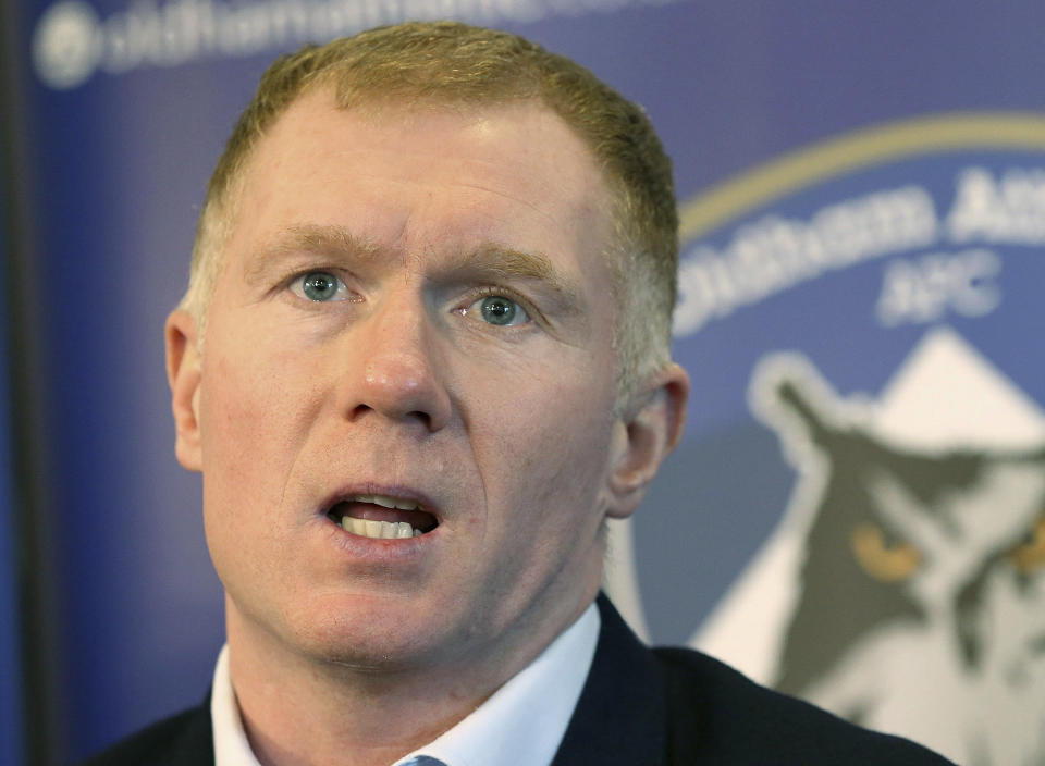 Newly unveiled Oldham Athletic soccer club manager Paul Scholes during a press conference at Boundary Park in Oldham, England, Monday Feb. 11, 2019. Former Manchester United midfielder Paul Scholes has landed his first managerial job at Oldham, which plays in England's fourth division.(Barrington Coombs/PA via AP)