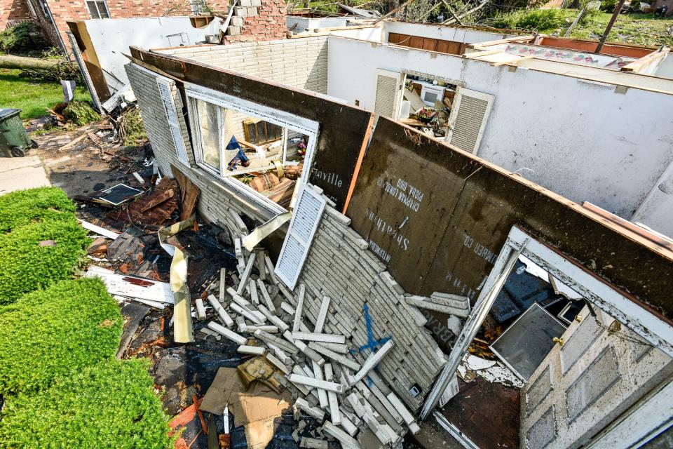 Volunteer groups and residents worked together Saturday, June 1 to clear debris from some of the neighborhoods in Trotwood and other areas hit by the tornado (WHIO File)