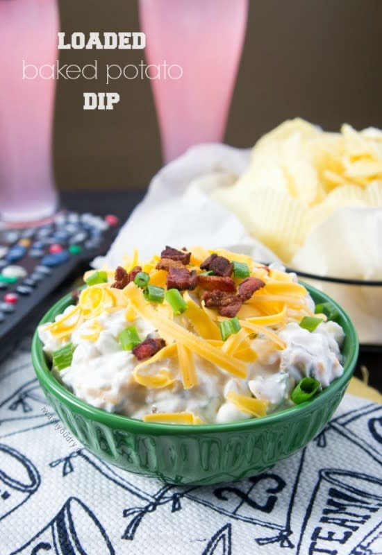 <p>I Wash You Dry</p><p>Baked potatoes may not be what you'd serve up at a tailgating party but Loaded Baked Potato Dip captures all of the same flavors in one cheesy bite. </p><p><strong>Get the recipe: <a href="http://www.iwashyoudry.com/2013/09/20/loaded-baked-potato-dip/" rel="nofollow noopener" target="_blank" data-ylk="slk:Loaded Baked Potato Dip;elm:context_link;itc:0;sec:content-canvas" class="link rapid-noclick-resp">Loaded Baked Potato Dip</a></strong></p>