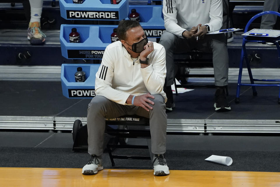 Kansas head coach Bill Self watches from the bench against USC during the second half of a men's college basketball game in the second round of the NCAA tournament at Hinkle Fieldhouse in Indianapolis, Monday, March 22, 2021. (AP Photo/Paul Sancya)